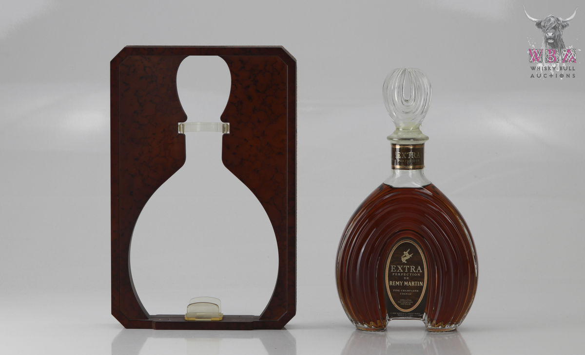 Sold at Auction: Remy Martin Cognac Bottle